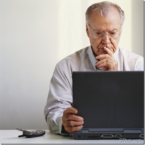 Older workers, man at laptop computer